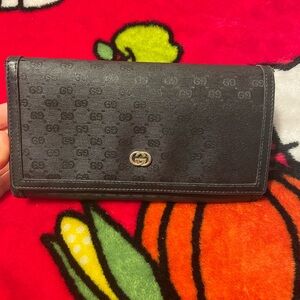 Gucci Black Monogram Wallet with Gold Emblem